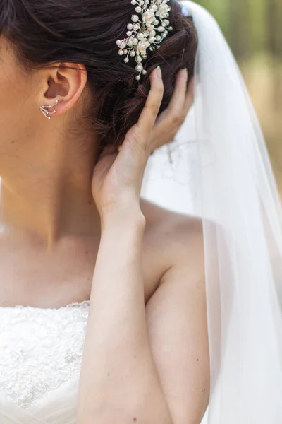 Bride in the morning during wedding preparations.