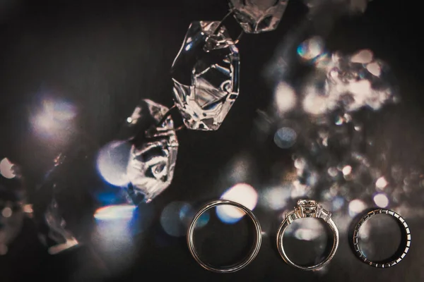 Three Wedding Rings Shiny Background — Stock Fotó