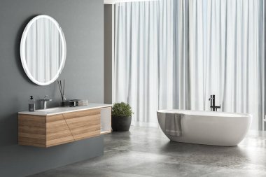 Mavi arka planlı modern banyo, beton döşeme, beyaz küvet, duş ve lavabo, yan görüş. Modern mobilyalı minimalist banyo. 3B görüntüleme