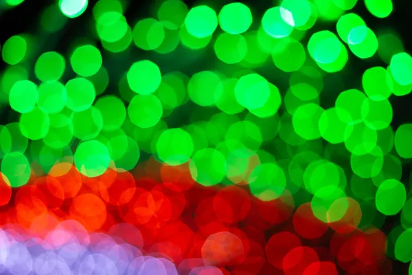 Oskärpa röd, vit och grön abstrakt bokeh ljus bakgrund. — Stockfoto