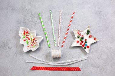 Christmas wreath ormaments from paper straw. Step 1 Materials for manufacturing. clipart