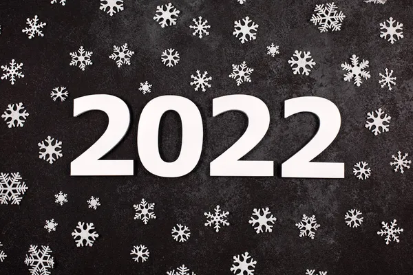 Bannière de félicitations Joyeux Noël et bonne année 2022 wiht blanc différentes tailles flocons de neige — Photo