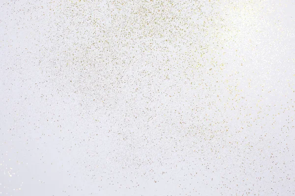Gold Glitter Scattered White Background Festive Background — Fotografia de Stock
