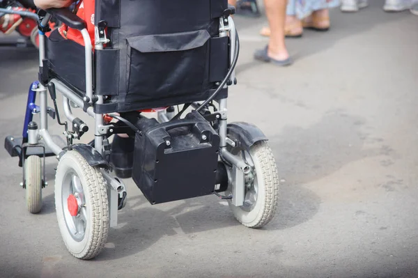 Modern electric wheelchair, rear view. horizontal photography