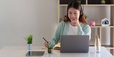 Young college student have question and answer to teacher by video call E-learning ,online ,education concept