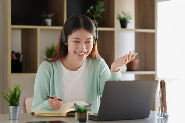 Young college student have question and answer to teacher by video call E-learning ,online ,education concept — Stockfoto