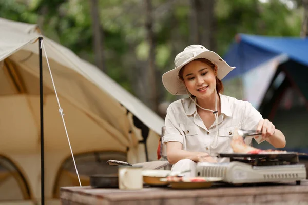 Asian woman journey and camping in Thailand. Travel outdoor activity lifestyle