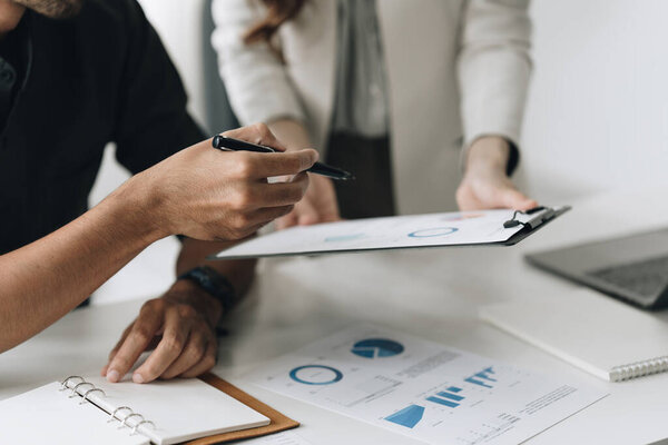 Fund managers team consultation and discuss about analysis Investment stock market. Business and Finance concept