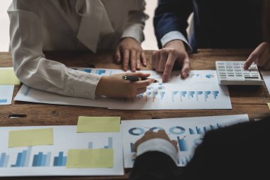 Business team have data dashboard document and analysis by brainstorming.