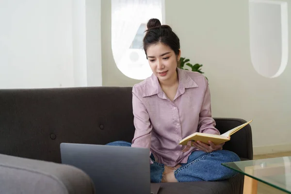 Asian Woman Using Laptop Sitting Sofa Home Office —  Fotos de Stock
