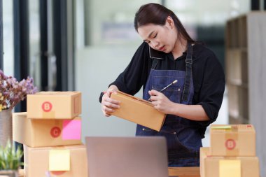 Starting Small business entrepreneur SME freelance Asian working at home.