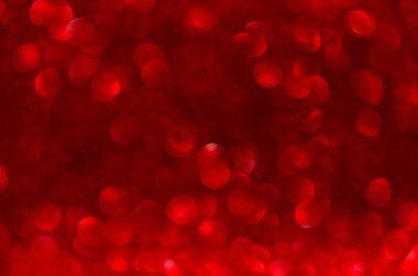 Noel soyut kırmızı arkaplan, kırmızı parıltı bokeh dağıldı.