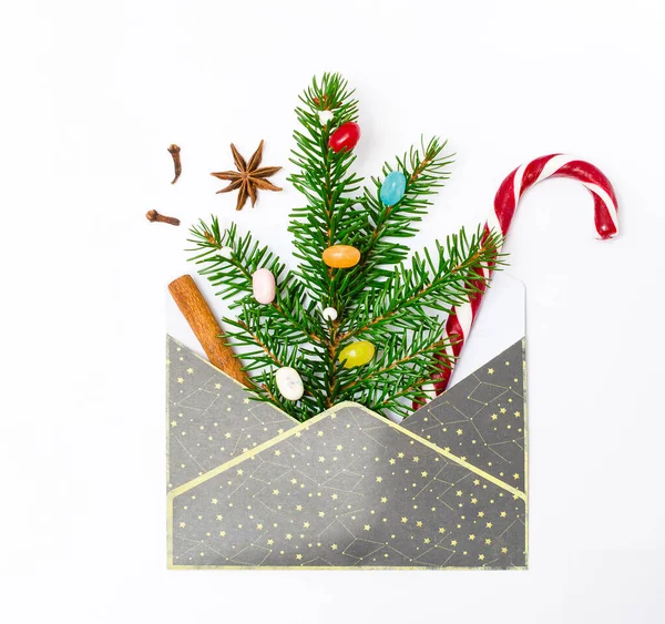 Concepto Navidad Sobre Gris Con Rama Abeto Decorado Con Caramelos —  Fotos de Stock