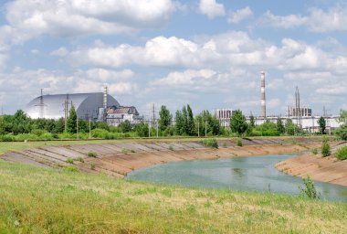 view of Chernobyl power plant with new safe confinement, Pripyat, Ukraine - June 19, 2021