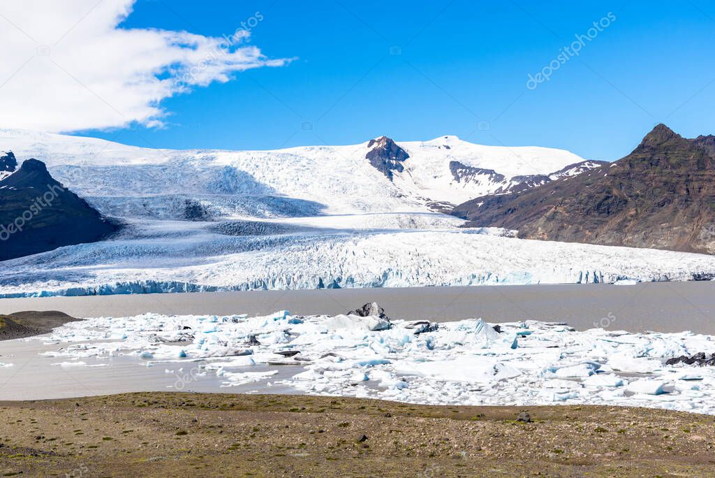View of a majestic glacier on a sunny summer day. Vatnajokull, Iceland.
