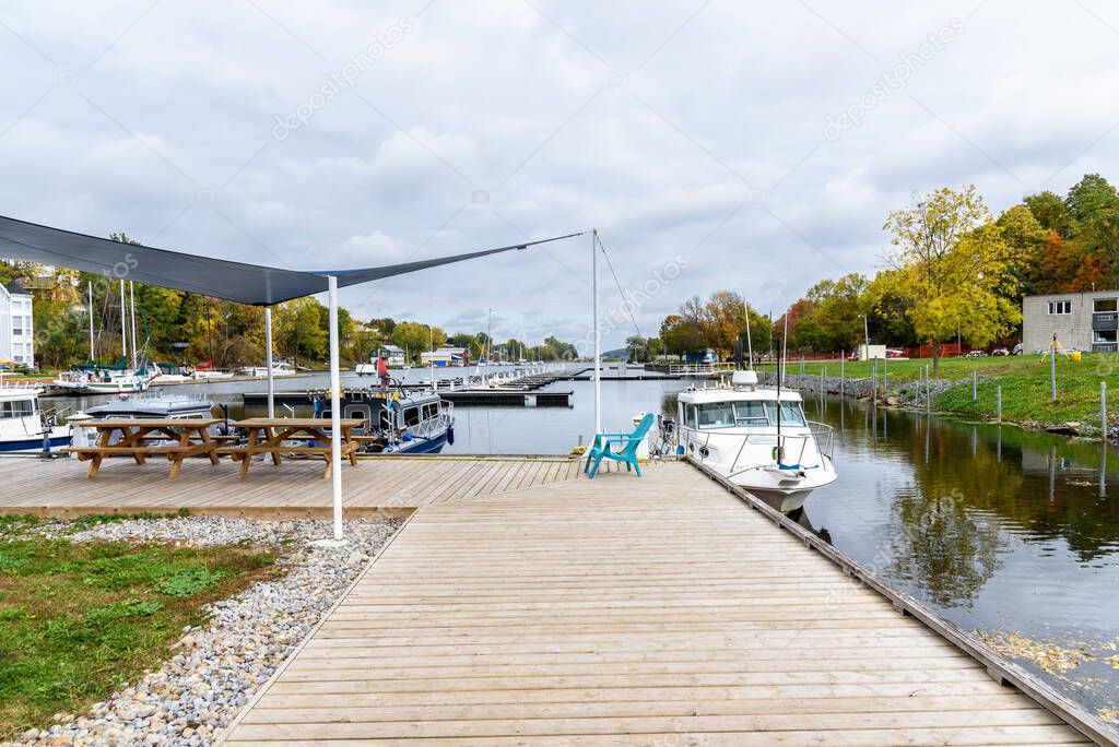View of a harbour on a lake on a cloudy autumn day. Picton, ON, Canada.