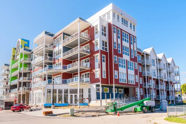 New apartment block still under construction on a clear autumn morning. Grananoque, ON, Canada.