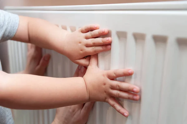 Baby hands measure battery temperature. Usually, the heating season in Ukraine starts either from October 15th and finishes on April 15th or it can start if the temperature is below 8C outside.