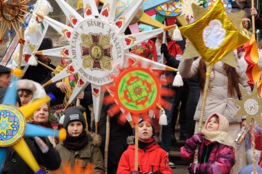 Lviv, Ukraine, 8 January 2022. Children hold stars during procession of zvizdari (Christmas Star carriers) held as part of the Spalakh rizdvianoi zvizdy (The Flash of the Christmas Star) Festival in Lviv, western Ukraine. Every year, enthusiasts take