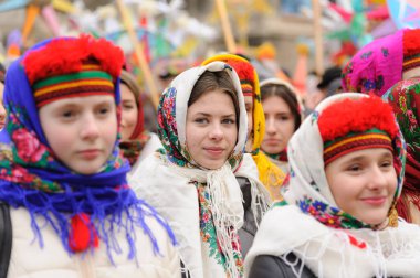 Lviv, Ukraine, 8 January 2022. Ukrainian woman in national clothing during procession of zvizdari (Christmas Star carriers) held as part of the Spalakh rizdvianoi zvizdy (The Flash of the Christmas Star) Festival in Lviv, western Ukraine. Every year,