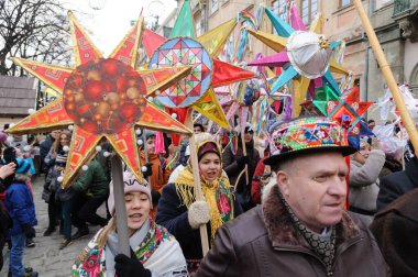 Lviv, Ukraine, 8 January 2022. Procession of zvizdari (Christmas Star carriers) held as part of the Spalakh rizdvianoi zvizdy (The Flash of the Christmas Star) Festival in Lviv, western Ukraine. Every year, enthusiasts take to the streets of Lviv. Th
