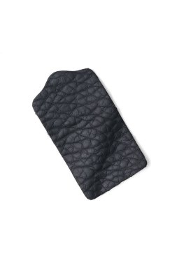 Beyaz arka planda siyah deri etiket var. Hakiki deriden yapılmış ürünler..