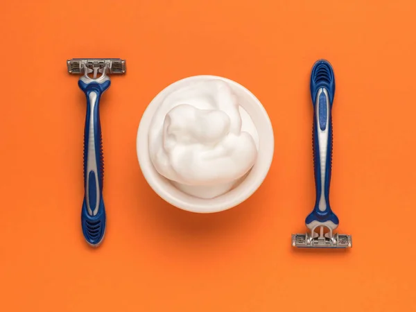 Bowl Shaving Foam Two Plastic Razors Orange Background Men Accessories — Stock Photo, Image