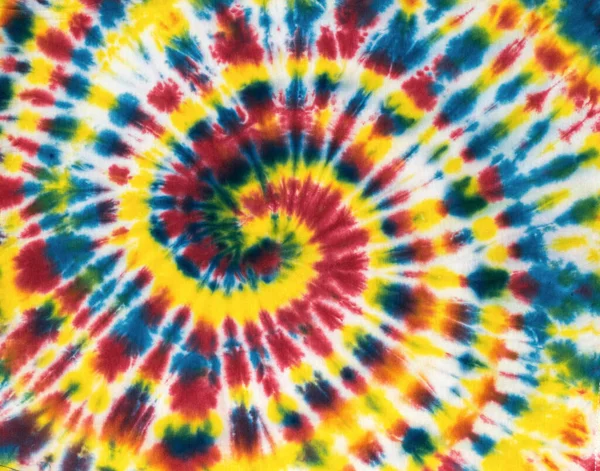 Kumaşta gökkuşağı renkli kravat deseni var. Kumaşın arka planı kendi ellerinle yapıldı. Düz yatıyordu.