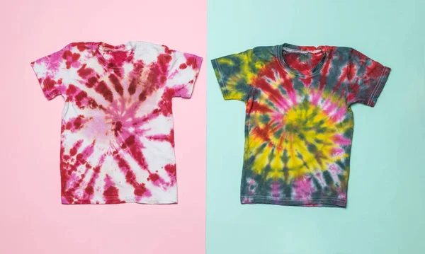 Neatly Stacked Two Tie Dye Shirts Pink Blue Background Staining — 图库照片