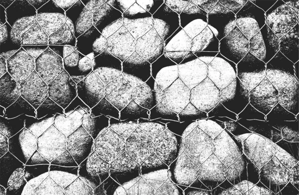 Distressed overlay texture of stones, rocks, pebbles, macadam inside the metalic mesh, net. grunge background. abstract halftone vector illustration