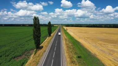 The country highway at the summer day aerial view
