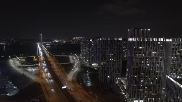 Downtown arranha-céus noite com luzes da cidade vista aérea — Vídeo de Stock