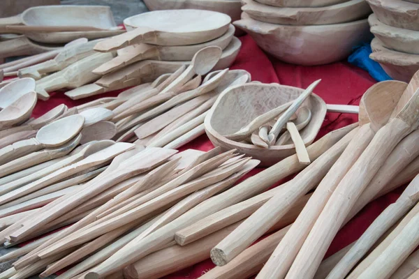 Handmade woodwork of spoons and cutting board