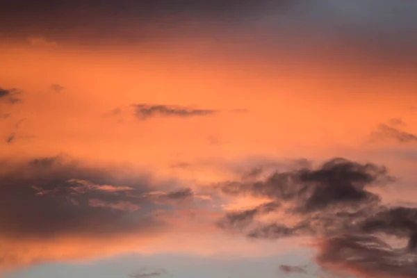 Orange pink vanilla sky at sunset photo