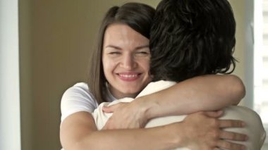 Long-awaited meeting. Young woman hugs her mother. HD.
