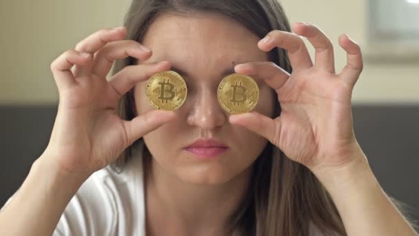 Portrait Frustrated Woman Covering Her Eyes Golden Bitcoins Fall Price — Vídeos de Stock