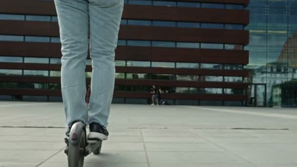 Man Backpack Protective Helmet Rides Electric Scooter City Square Concept — Stock video