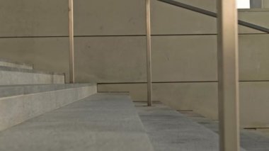 Legs of different people climbing the stairs of an underpass or subway. HD.