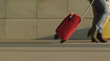 Feet of different people hurrying about their business in an underpass, at a train station or in the subway. An ordinary city day. 4K.