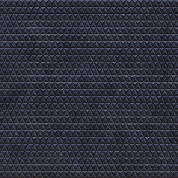 Baldosas triangulares flamencas de basalto. Azulejos con granulado de basalto en forma de triángulos cubren toda la superficie del fondo. Construcción abstracta fondo azul con azulejos. Representación en 3D —  Fotos de Stock