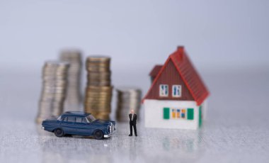 Para, VIP sınıfı bir araba ve bir ev bir iş adamının başarısının ve zenginliğinin özellikleridir. Finansal yatırımlar ve yatırımlar. Başarılı para kazanma kavramı