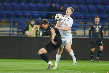 KHARKIV, UKRAINE - 4 Aralık 2021: Ukrayna Premiere Ligi Metalist-1925 Kharkiv-FC Kolos Kovalivka futbol karşılaşması