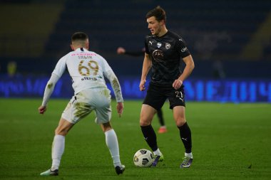 KHARKIV, UKRAINE - 4 Aralık 2021: Ukrayna Premiere Ligi Metalist-1925 Kharkiv-FC Kolos Kovalivka futbol karşılaşması