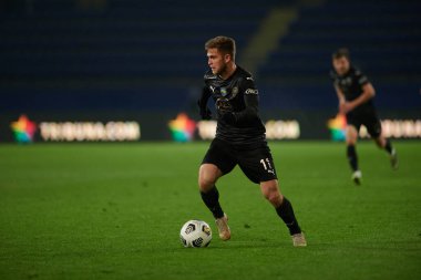 KHARKIV, UKRAINE - 4 Aralık 2021: Ukrayna Premiere Ligi Metalist-1925 Kharkiv-FC Kolos Kovalivka futbol karşılaşması