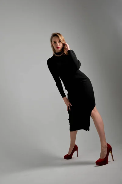 Pretty Young Female Makeup Black Dress Red Shoes Posing Camera — стоковое фото