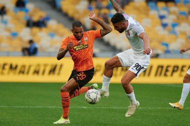 KYIV, UKRAINE - OCTOBER 15, 2021: midfielder Fernando (99) vs Allahyar Sayyadmanesh (90). The football match of UPL, FC Shakhtar Donetsk vs FC Zorya Luhansk