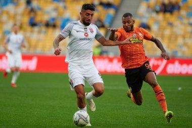 KYIV, UKRAINE - OCTOBER 15, 2021: midfielder Fernando (99) vs Allahyar Sayyadmanesh (90). The football match of UPL, FC Shakhtar Donetsk vs FC Zorya Luhansk