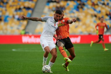 KYIV, UKRAINE - OCTOBER 15, 2021: midfielder Fernando (99) vs Allahyar Sayyadmanesh (90). The football match of UPL, FC Shakhtar Donetsk vs FC Zorya Luhansk