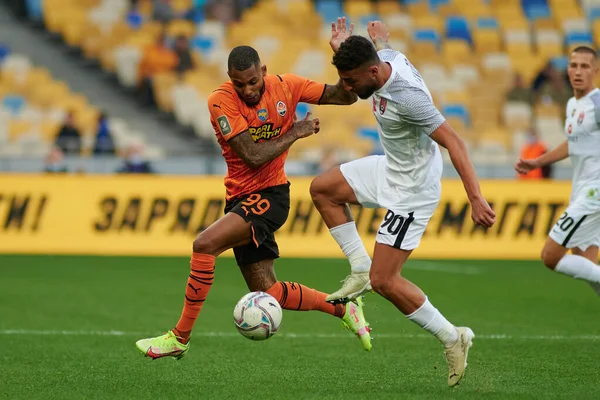 KYIV, UKRAINE - OCTOBER 15, 2021: midfielder Fernando (99) vs Allahyar Sayyadmanesh (90). The football match of UPL, FC Shakhtar Donetsk vs FC Zorya Luhansk