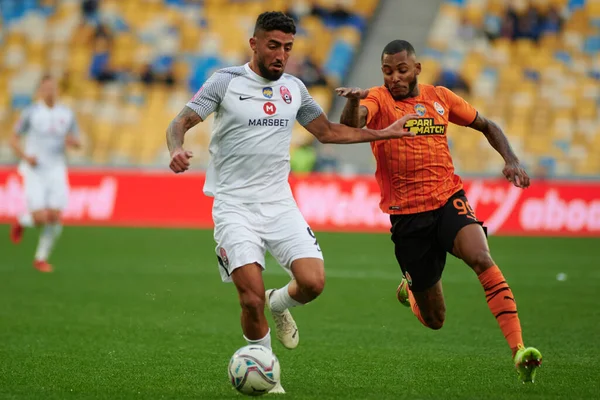KYIV, UKRAINE - OCTOBER 15, 2021: midfielder Fernando (99) vs Allahyar Sayyadmanesh (90). The football match of UPL, FC Shakhtar Donetsk vs FC Zorya Luhansk